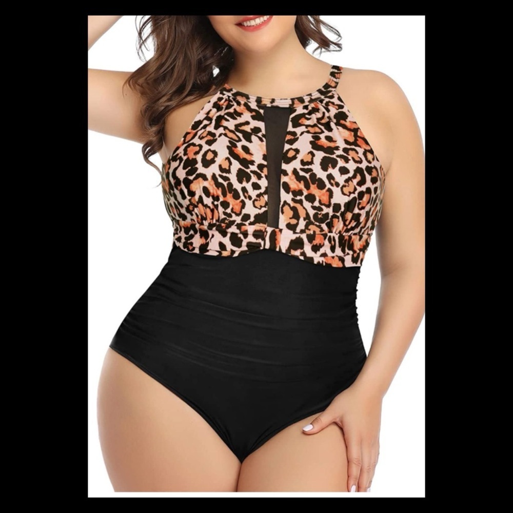 Animal, print piece, sexy swimsuit with black bottom.